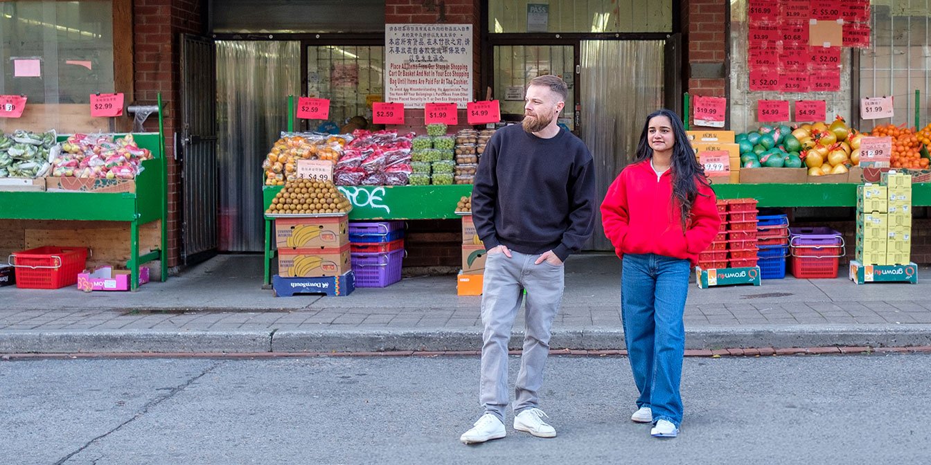Portrait of the website design and SEO services team from idearium, in front of a local market.